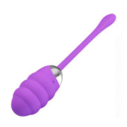 Ovulo vibrante viola in silicone medicale con rilievi concentrici e base metallica