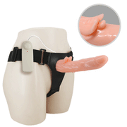 Dettaglio testa realistica dildo rosa con texture anatomica su strap-on