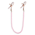 Weiße Nippelklemmen mit rosa Perlen