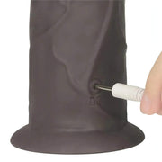 Primo piano ricarica magnetica porta DC su base dildo vibrante nero in silicone flessibile