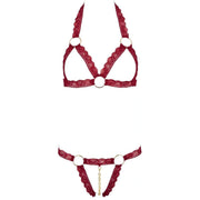 Reggiseno e perizoma rosso pizzo vista frontale con anelli metallici e motivo floreale
